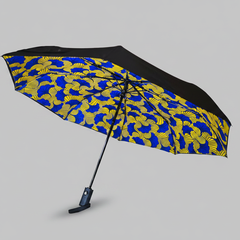 Umbrella with blue and yellow pattern on a gray background